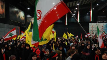 Supporters of Hezbollah wave national, Iranian as well as the movement's yellow flag during celebrations in Beirut, Feb. 6, 2019. (File Photo: Reuters)