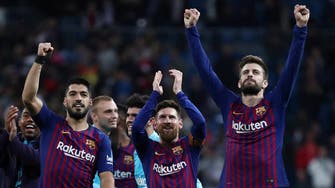 Barca hailed as champions-elect after beating Real Madrid