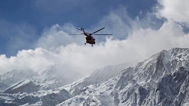 Emergency and rescue helicopter searches for another plane that crashed in a mountainous area of central Iran on February 19, 2018. (AFP)
