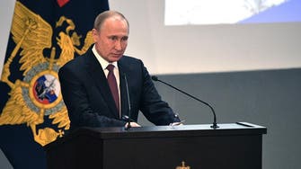 Putin suspends INF arms treaty with US