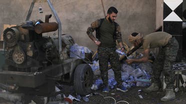 عناصر من قوات سوريا الديمقراطية في الباغوز(4/3/2019- رويترز)