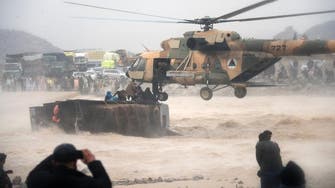 Flash floods, snow and rain kill at least 59 in Afghanistan