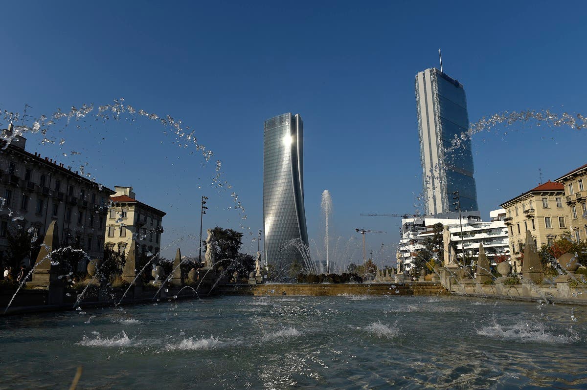 The Generali tower (L) also called Hadid tower designed by Zaha Hadid studio and the Allianz tower designed by Japanese Arata Isozaki and Andrea Maffei in the Citylife neighborhood, western Milan. (AFP)