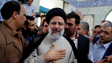 Iranian presidential candidate Ebrahim Raisi leaves after casting his ballot for the presidential elections at a polling station in southern Tehran on May 19, 2017. 