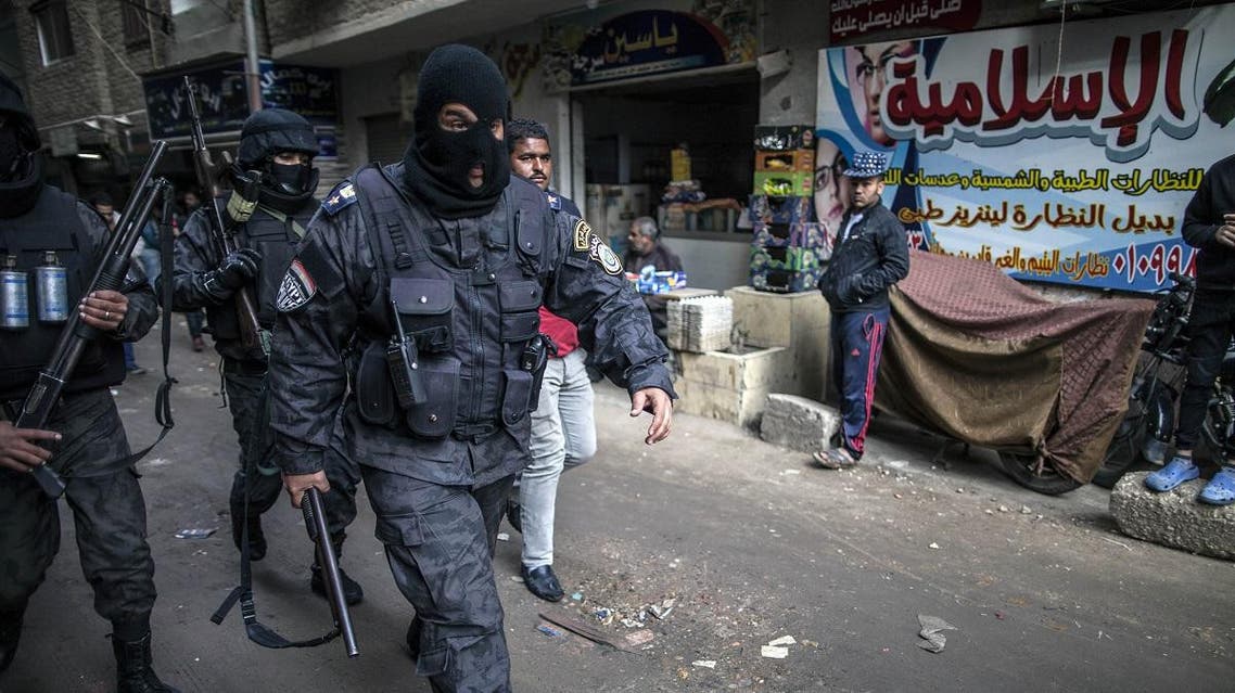Members of the Egyptian police special forces patrol streets in al-Haram neighbourhood in the southern Cairo Giza district. (AFP)