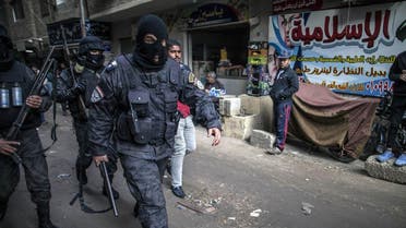 Members of the Egyptian police special forces patrol streets in al-Haram neighbourhood in the southern Cairo Giza district. (AFP)