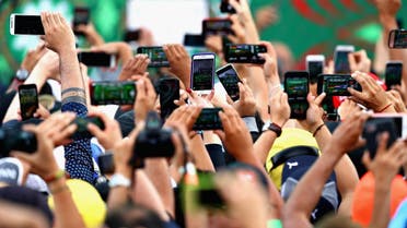 Smart phones social media (AFP)