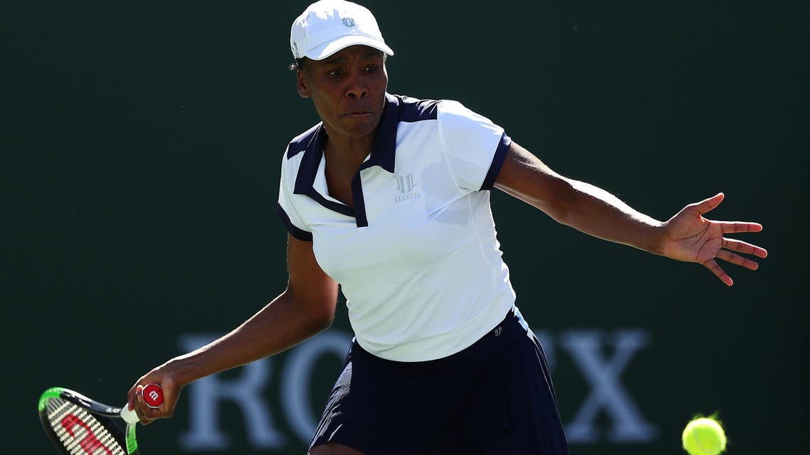 Venus Williams plays a forehand against Andrea Petkovic of Germany during their match in Indian Wells on March 07, 2019. (AFP)
