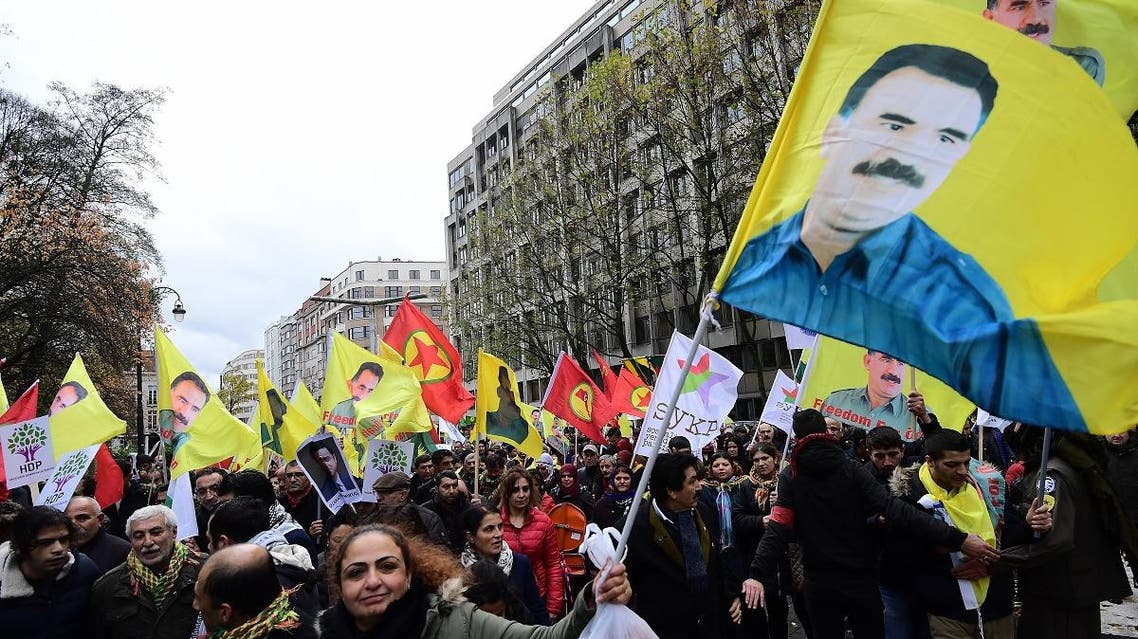 A file photo shows flags depicting jailed Kurdistan Workers Party (PKK) leader Abdullah Ocalan during a pro-Kurdish demonstration in Brussels. (AFP)