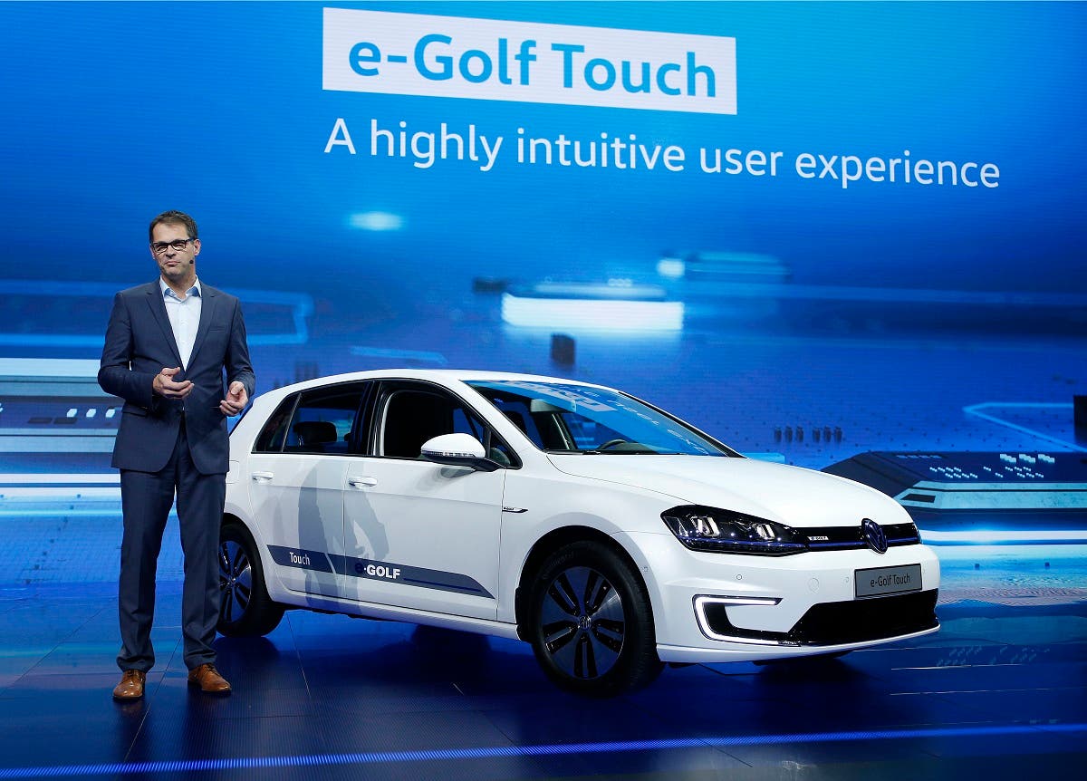 Volkmar Tanneberger, head of electric and electronic development at Volkswagen, talks about the e-Golf Touch electric car during a keynote address at CES International. (File photo: AP)