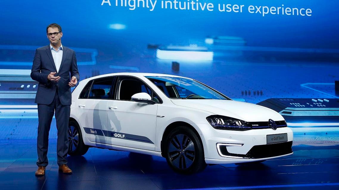 Volkmar Tanneberger, head of electric and electronic development at Volkswagen, talks about the e-Golf Touch electric car during a keynote address at CES International. (File photo: AP)