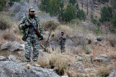 Pakistan's army soldiers guard the area, after Indian military aircrafts struck on February 26, according to Pakistani officials, in Jaba village, near Balakot, Pakistan, on March 7, 2019. (Reuters)