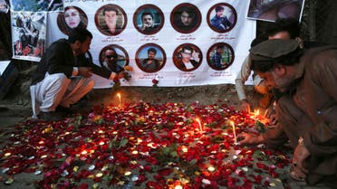 Afghan residents light candles to pay tribute to Afghan journalists killed in suicide attack in Kabul on May 3, 2018. (File photo: AP)