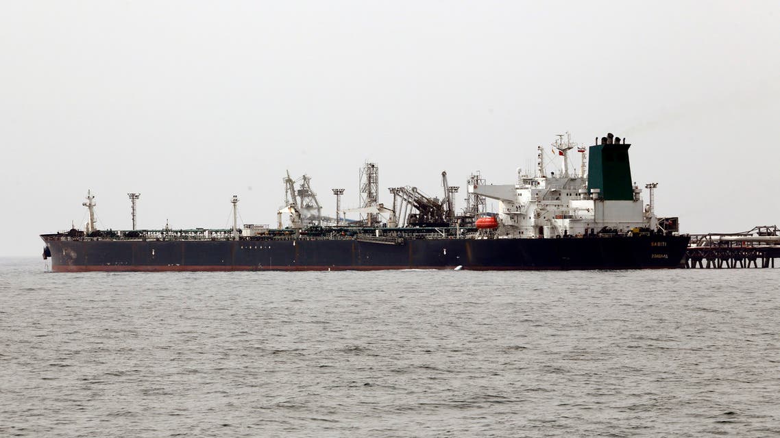 A picture taken on March 12, 2017, shows an Iranian tanker docking at the platform of the oil facility in the Khark Island, on the shore of the Gulf.