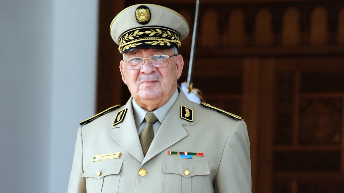 Algeria's Chief of Staff General Ahmed Gaid Salah is seen for the arrival of French Defence Minister Jean-Yves Le Drian at the Houari-Boumediene International Airport in Algiers, on May 20, 2014. Drian in on a 24-hour official visit to the north African country. AFP PHOTO/FAROUK BATICHE