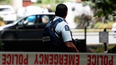 A police officer secures the area in front of the Masjid al Noor mosque after a shooting incident in Christchurch  (AFP)