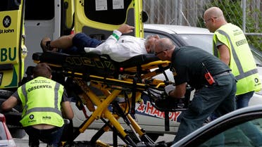Ambulance staff take a man from outside a mosque in central Christchurch on March 15, 2019. (AP)