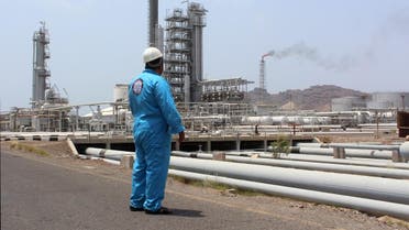 A Yemeni oil worker looks out at the Aden oil refinery after it was re-actived on September 5, 2016. (AFP)