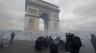 French yellow vest protesters clash with police in Paris