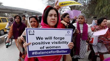 A participant carries a sign during a rally to mark International Women’s Day in Peshawar, Pakistan March 8, 2019. (Reuters)