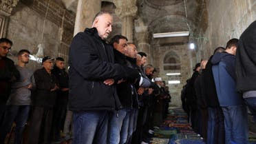Palestinian Muslims pray inside the Golden Gate near Al-Aqsa mosque in Jerusalem's Old City. (Reuters)