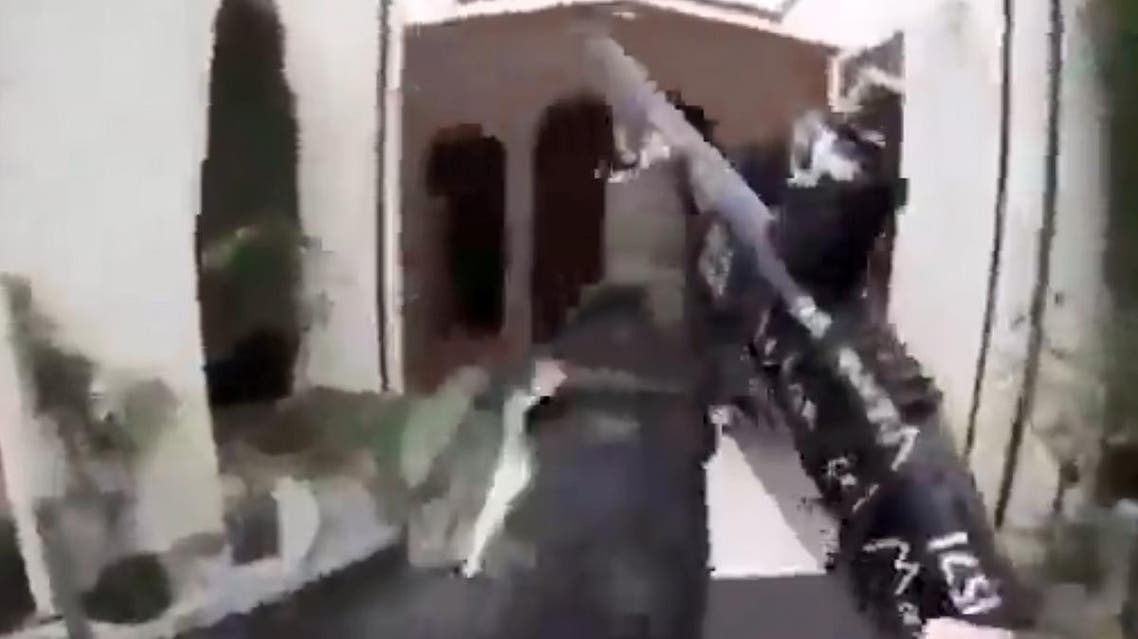 This image grab from a self-shot video that was streamed on Facebook Live on March 15, 2019 by the man who was involved in two mosque shootings in Christchurch shows the man holding a gun as he enters the Masjid al Noor mosque. (AFP)