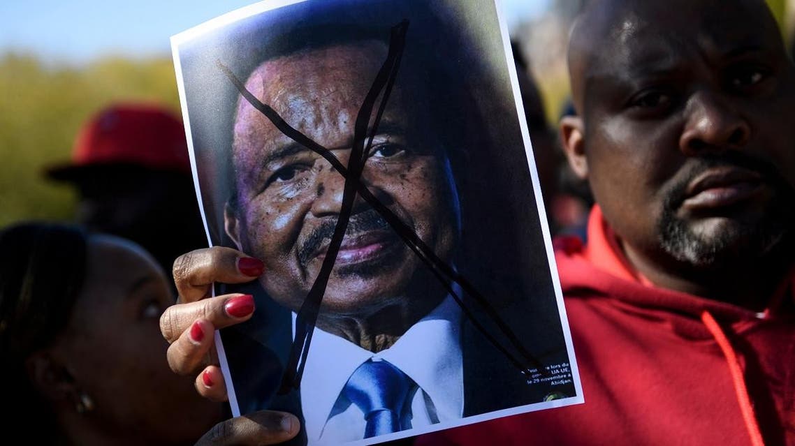 People protest Cameroon's President Paul Biya on Pennsylvania Avenue near the White House October 22, 2018 in Washington, DC. (AFP)