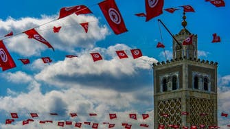 Tunisia raises minimum wages, pensions to tackle discontent