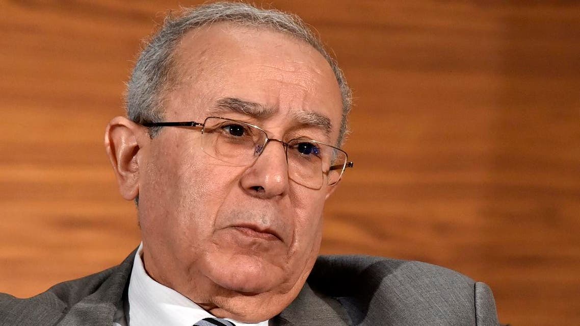 Newly appointed Algeria's vice prime minister Ramtane Lamamra attends a joint press conference with the prime minister in Algiers on March 14, 2019. (AFP)