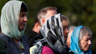 New Zealand marks one week since mosque attack with prayers, headscarves