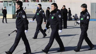 Chinese police officers march past on Tiananmen Square in Beijing. (File photo: AP)