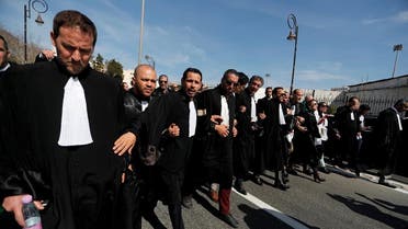 Algerian Lawyers march during a protest to denounce an offer by President Abdelaziz Bouteflika. (Reuters)