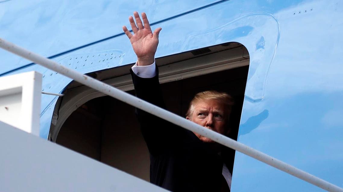 President Donald Trump boards Air Force One, Sunday, March 24, 2019, at Palm Beach International Airport, in West Palm Beach, Fla., en route to Washington. (AP)