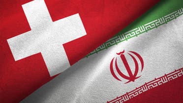 Iran and Switzerland two flags together realations textile cloth fabric texture - Stock image