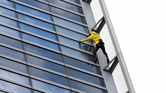 ‘French Spiderman’ climbs Paris skyscraper harness-free            
