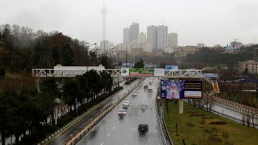 A picture taken on March 26, 2019, shows drivers on a wet road during a rainy day in the Iranian capital Tehran. (AFP)