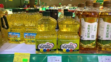 Bottles of Canola Harvest brand canola oil, manufactured by Canadian agribusiness firm Richardson International, are seen on the shelf of a grocery store in Beijing. (AP)