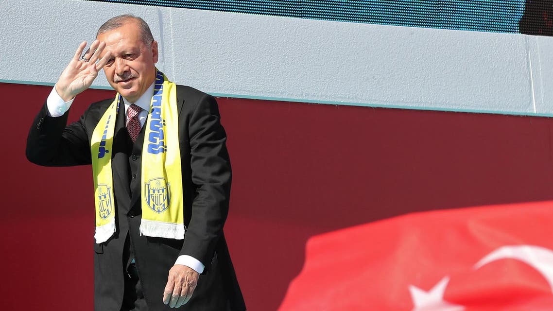 Turkish President Recep Tayyip Erdogan walks on stage during a local election campaign rally in Ankara, Turkey, on March 23, 2019. (AFP)