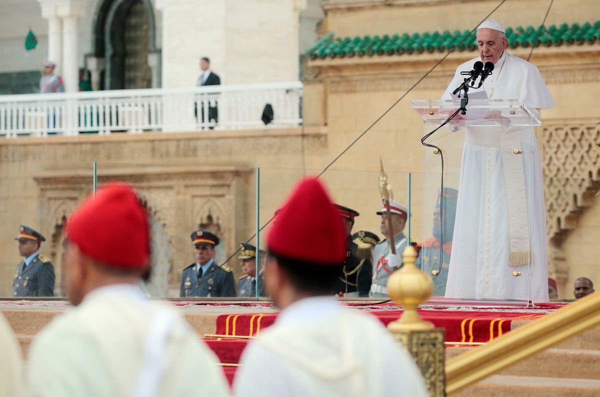 Pope Francis delivers a speech as he and King Mohammed VI of Morocco visit the Hassan Tower esplanade in Rabat. (Reuters)