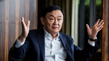 Exiled former Thai prime minister Thaksin Shinawatra being interviewed by Agence France-Presse in Hong Kong. (AFP)