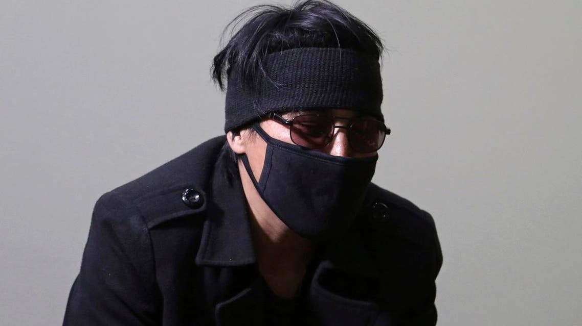 Abdullah, a former Afghan fighter in Syria with the Fatimiyoun Brigade, wears a mask to hid his identity during an interview with The Associated Press in Kabul, Afghanistan. (AP)