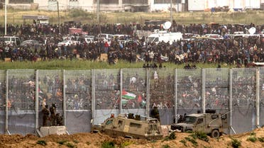Israeli soldiers take positions on the Israel and Gaza border during a Palestinian protest, Saturday, March 30, 2019. (AP)