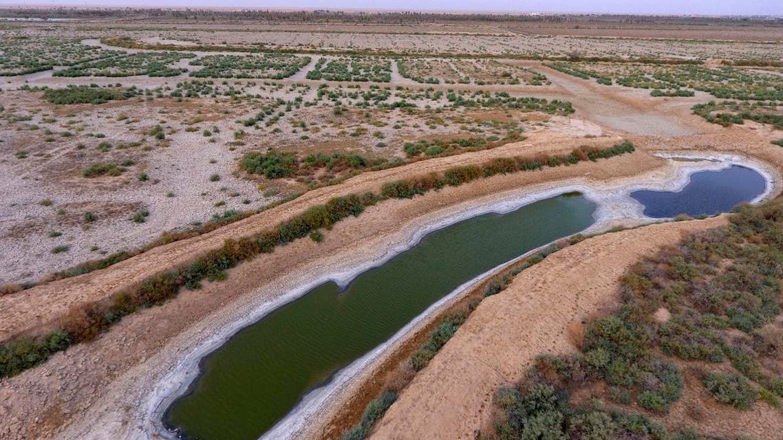 aerial photo shows a dry canal full of salt in the area of Siba in Basra, 550 km southeast of Baghdad, Iraq. (AP)