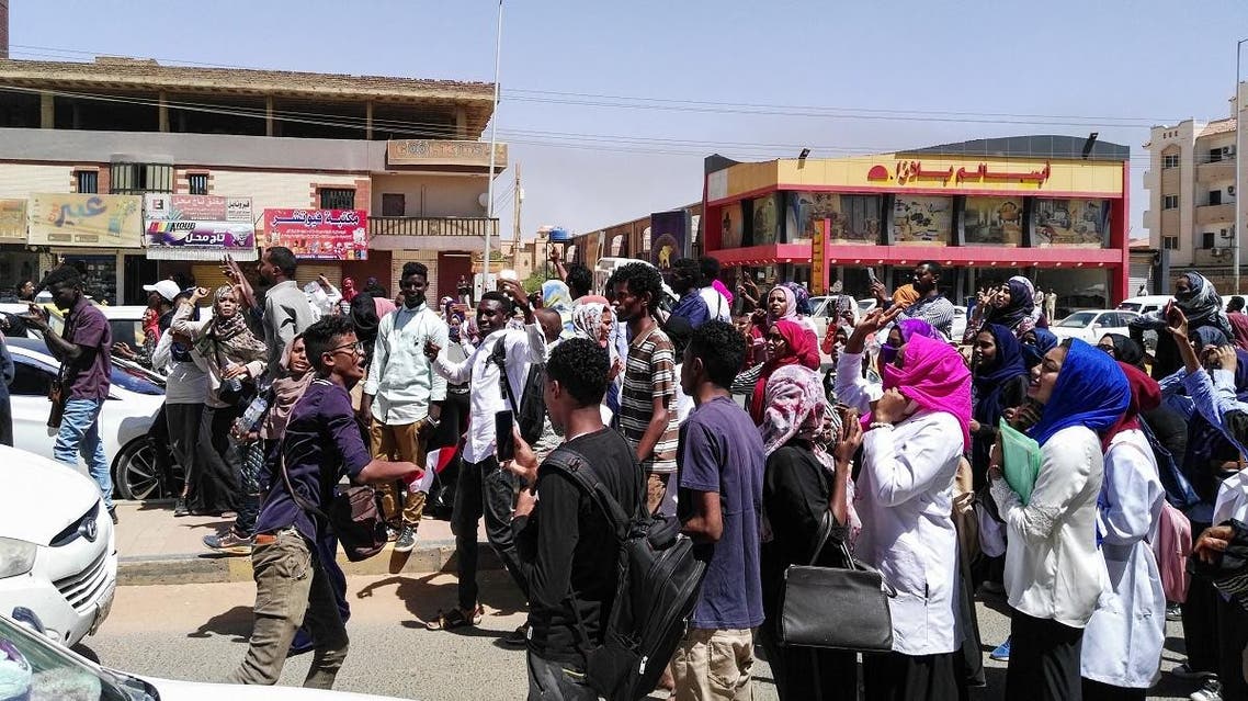 Protesters shout slogans during an anti-government demonstration in street 60 in the Sudanese capital Khartoum, on March 18, 2019. (AFP)