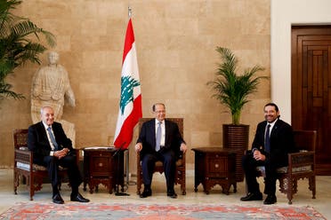 File photo of Lebanon’s President Michel Aoun (C) with former PM Saad Hariri (R) and Parliament Speaker Nabih Berri. (AP)