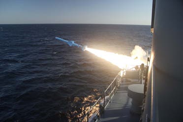 A handout photo made available by the Iranian Navy on February 23, 2019, shows a missile launch during a military drill in the Gulf of Oman. (AFP)