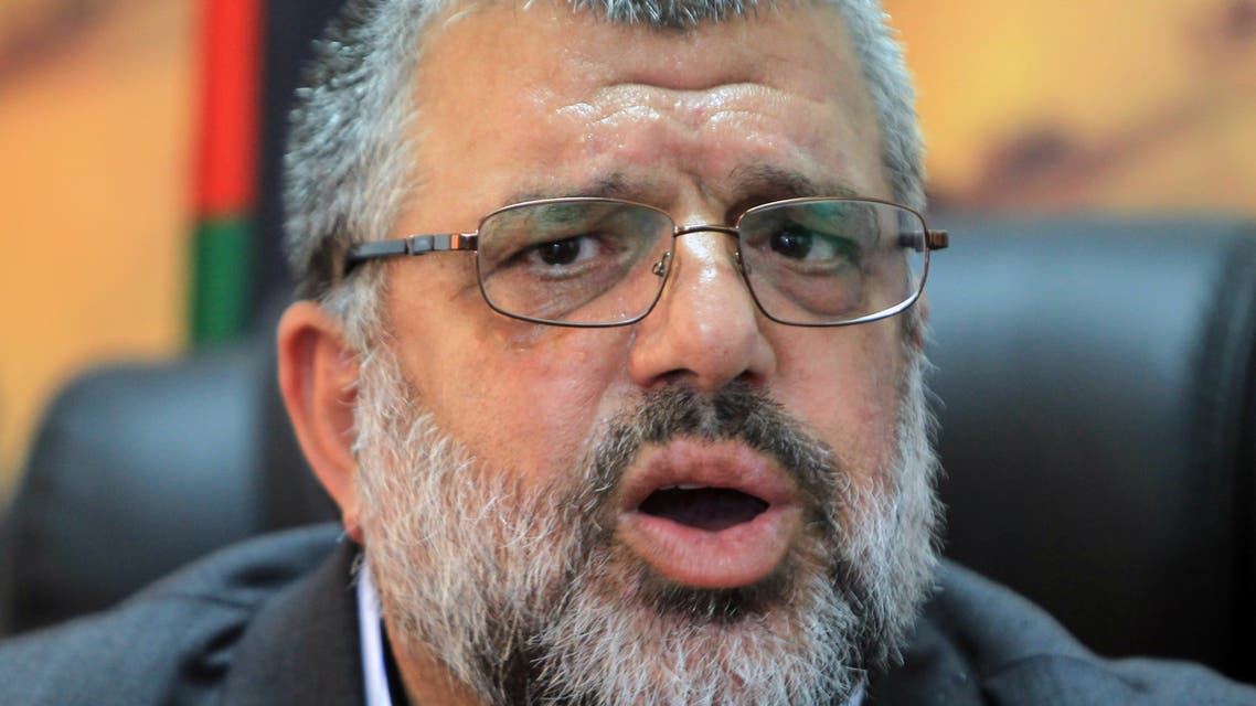 Palestinian Sheikh Hassan Yussef, one of the main Hamas political leaders in the West Bank, speaks during a news conference at his office in Ramallah on June 10, 2014. In a separate sign of reconciliation teething problems, Yusef slammed PA security forces for assaulting protesters at a rally in the West Bank city of Ramallah to support hunger-striking Palestinian prisoners, claiming that security forces had beaten several protesters, and even himself when he tried to intervene. AFP PHOTO/ABBAS MOMANI