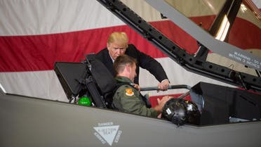 A file photo of President Trump speaking with a F-35 fighter jet pilot as he tours Luke Air Force Base in Phoenix, Arizona. (AFP)