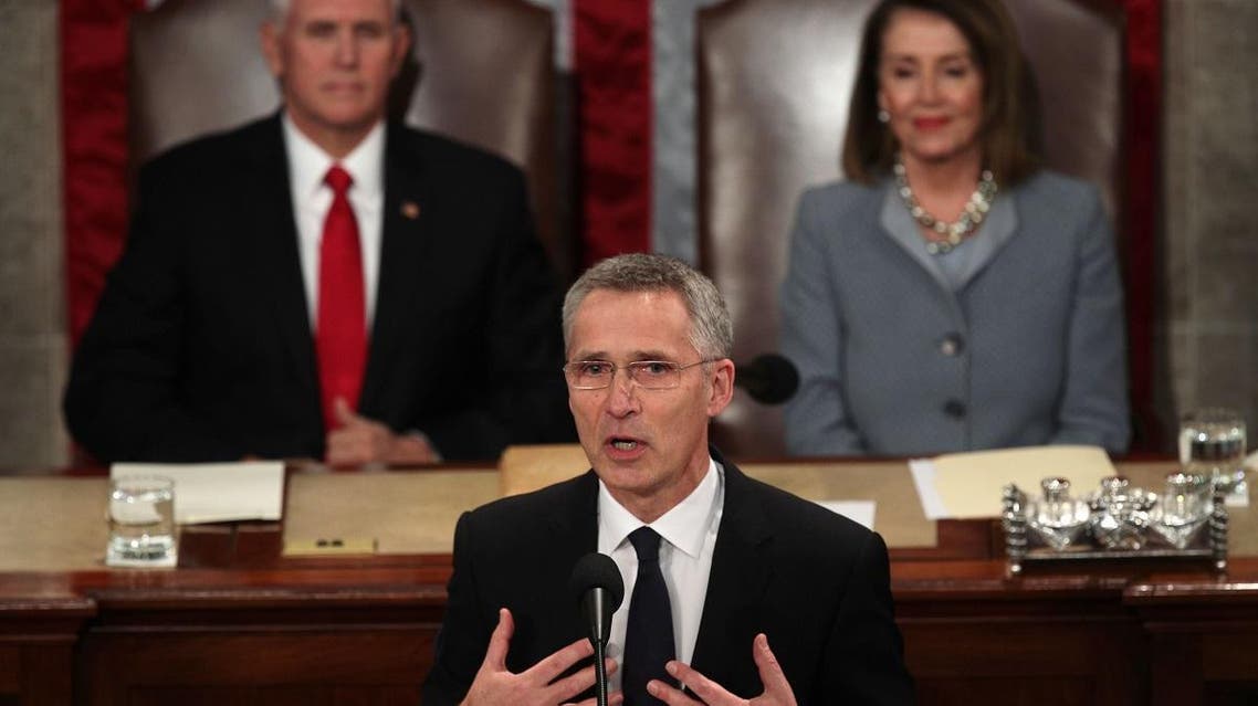 NATO Secretary General Jens Stoltenberg addresses a joint meeting of the US Congress as Vice President Mike Pence and Speaker of the House Rep. Nancy Pelosi listen on April 3, 2019 at the US Capitol in Washington, DC. (AFP)