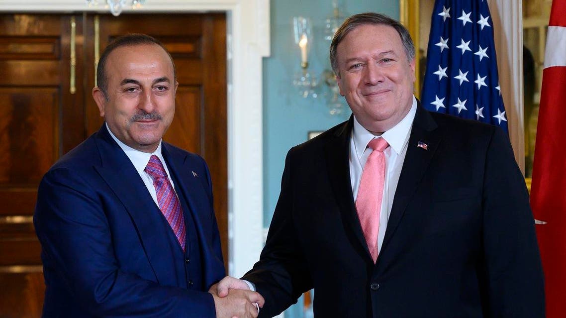 Pompeo and Turkey Foreign Minister Mevlut Cavusoglu. (AFP)